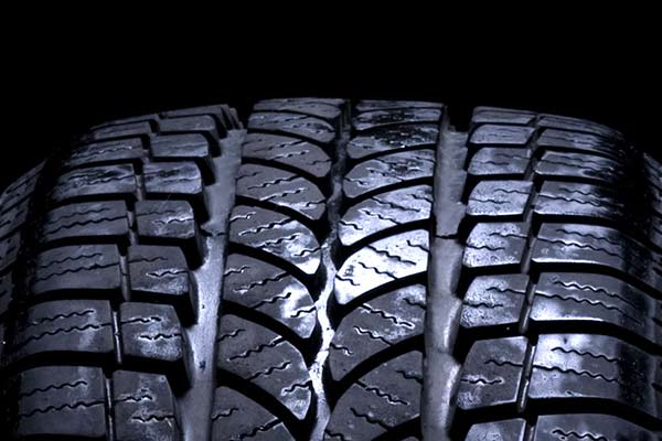 Car tires isolated on black background