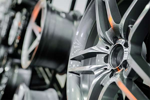 Close up of rims from a sports car. The concept of tuning the wheels of a car. Car wheel.